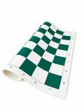 A rolled-up white board featuring a green and white checkerboard pattern with printed letter columns and numbers along the bottom edge, photographed on a clean white background.